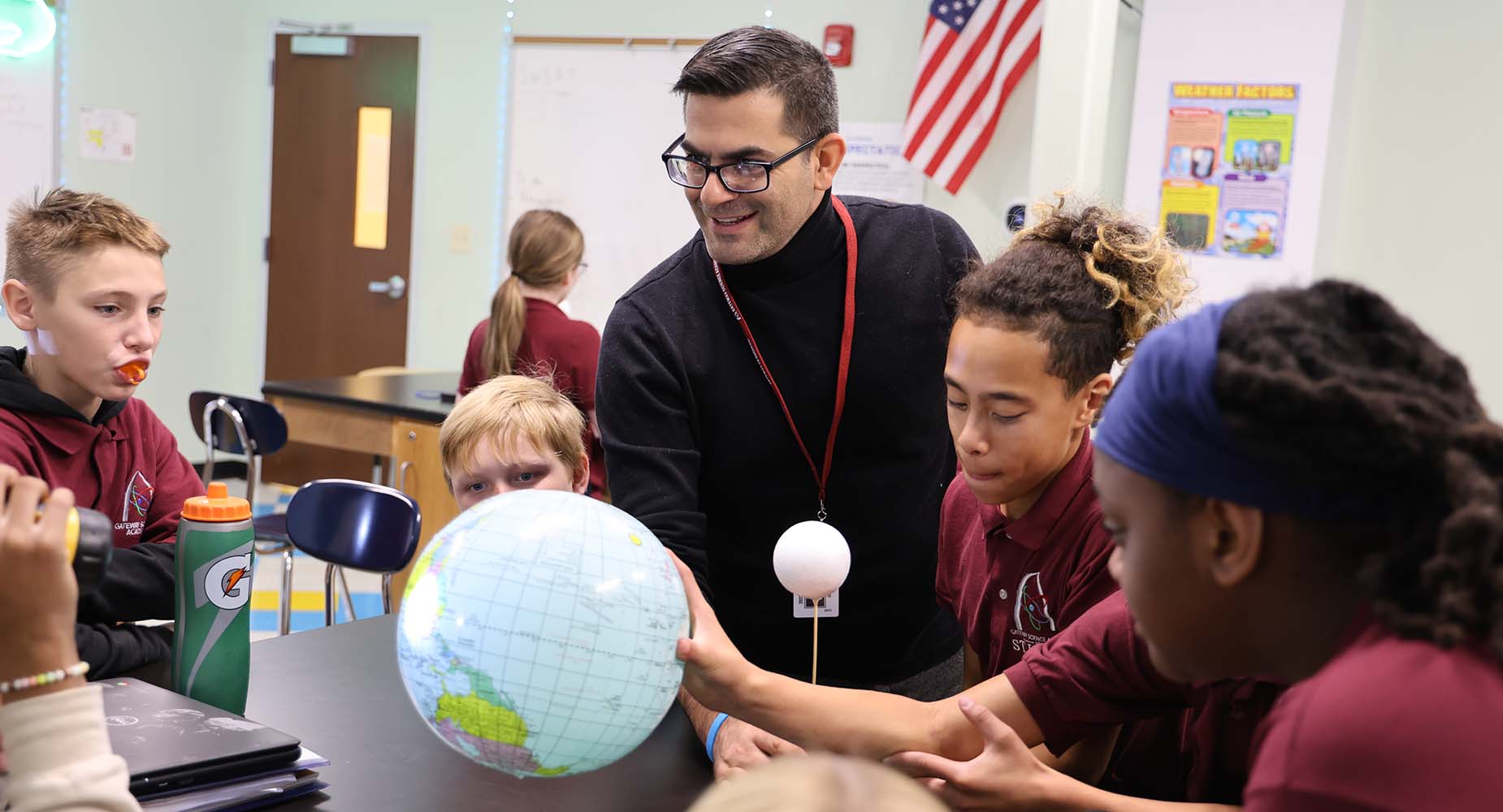 Teacher helping student